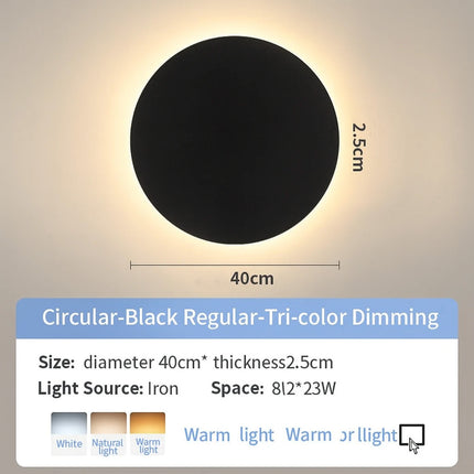 Dusk-to-dawn round wall light

