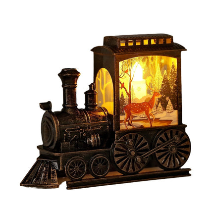 Holiday snow globe train decoration

