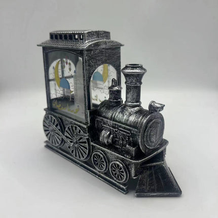 Snow globe with train and Santa

